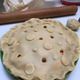 I used a large pastry tip to make two different sized circles to decorate this peach pie.